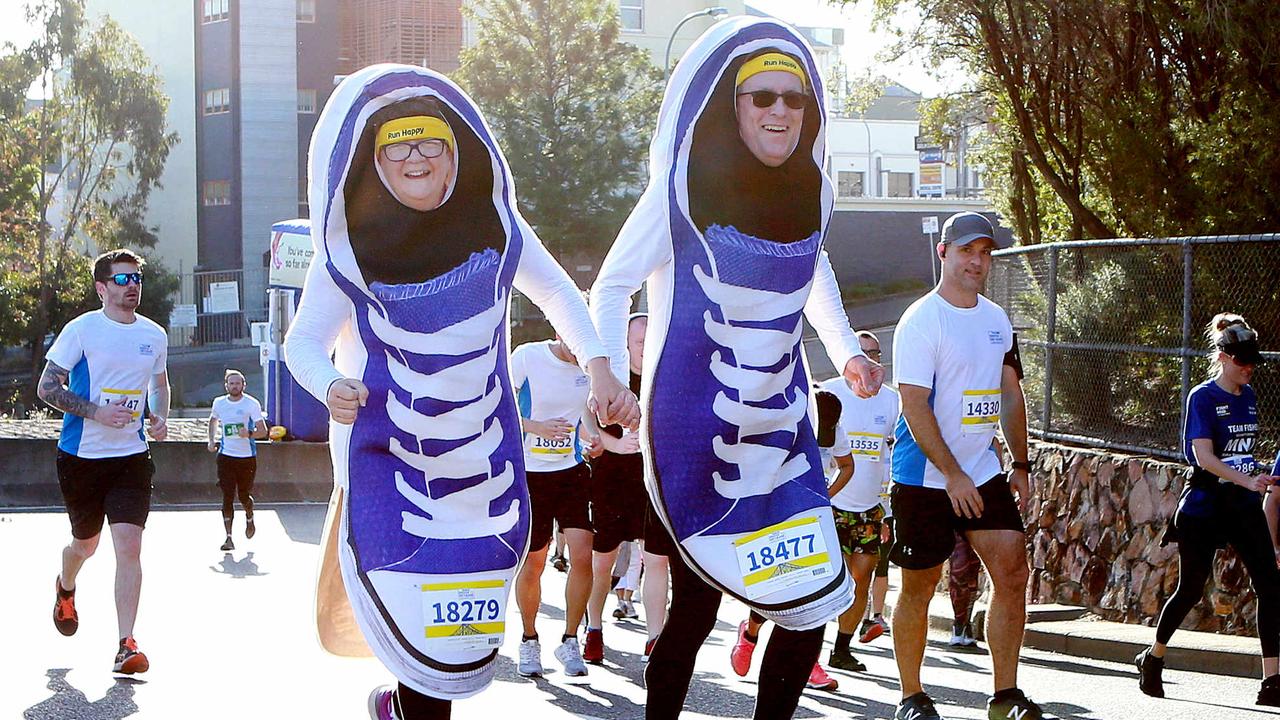 Katrina and Andrew Chisholm run in the Bridge to Brisbane race, Brisbane, Sunday August 25, 2019. (AAP/Image Sarah Marshall)