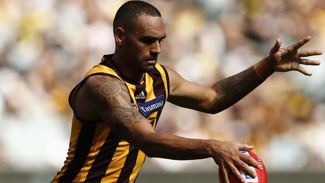 MELBOURNE, AUSTRALIA - MARCH 28: Shaun Burgoyne of the Hawks kicks the ball during the round 2 AFL match between the Hawthorn Hawks and the Richmond Tigers at Melbourne Cricket Ground on March 28, 2021 in Melbourne, Australia. (Photo by Darrian Traynor/Getty Images)