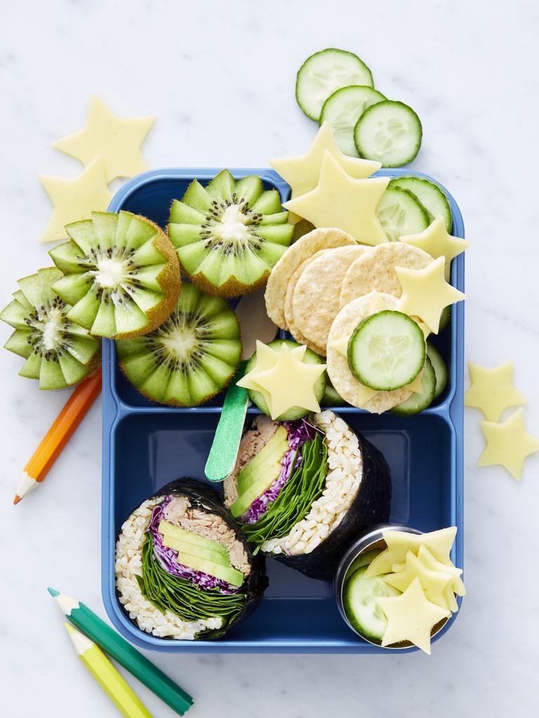 Kiwifruit were a lunch box favourite for Steph Gilmore growing up, just like in this lunch box which also features tuna and vegetable sushi roles, rice crackers and cheese. Picture: LifeEd