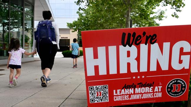 Australia companies will find it difficult to compete with countries like the United States which is offering up to 6 per cent wage growth, analysts say. (PICTURE: OLIVIER DOULIERY / AFP)