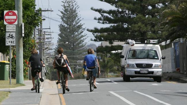 Helmetless cyclist at Mermaid Beach on Hedges Avenue. Cyclists and speed limits have been long-running issues.