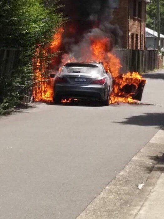 A car parked on Chandler St, Kogarah, was found on fire shortly after Hawi was shot. Picture: Claude Nunes