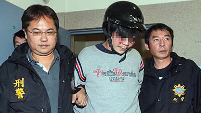 Image shows: The arrested assailant Source / copyright UNKNOWN > TAIPEI - A 33-year-old man was arrested in Taiwan on Monday (March 28) for allegedly chopping off the head of a four-year-old girl, reports said. The suspect, who reportedly has a history of mental illness, attacked the young girl at a Taipei suburb on Monday at about 11am, Focus Taiwan said. The attack happened right in front of her mother. Her grieving mother, Mrs Liu, told Apple Daily that she was about one metre away from her daughter, but could not stop the killer. The girl was going upslope on a strider bike when the suspect approached her from behind. She and her mother were on their way to a train station to meet her grandfather and her younger siblings. Thinking that the suspect was trying to help push her daughter up the slope, Mrs Liu did not attempt to stop him. Instead, he pulled out a chopper and brought it down on the little girl's neck, the newspaper said. When she realised what was happening, Mrs Liu tried to hold the killer back, but was not strong enough to stop him. Passers-by then helped to subdue the attacker, but by then, he had decapitated the victim. A blood-stained chopper was found near the crime scene, said Focus Taiwan. "I could not believe it. How can something so cruel happen?" the girl's grandmother sobbed as she told TVBS in Mandarin. The victim, nicknamed "Little Lightbulb", is the second of four children in her family. Her father works in the IT industry, and her mother is a housewife. She has a nine-year-old sister and a younger brother and sister who are two-year-old twins. A photo of the suspect, his face splattered with blood as he was brought in by the police, was published by Taiwanese media. The suspect, surnamed Wang, is said to be unemployed, and has a history of mental illness and drug offences. The case has shocked Taiwanese.201603280022t0001.jpg