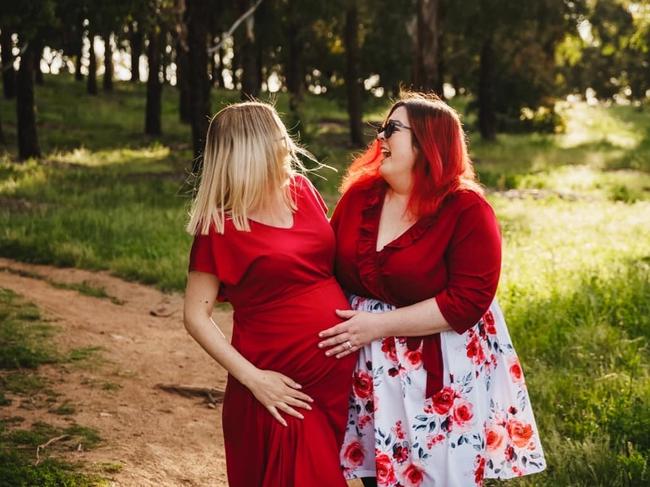 Nicole with surrogate Jaide. Jaide lives in Victoria and delivered baby Victoria in November 2022 for her best friends Nicole and Dan, who live interstate. Varying laws surrounding surrogacy across the country meant Victoria was legally Jaide's for four months, despite her having no genetic connection to the child. Picture: Supplied