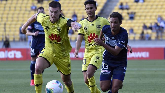 Tim Payne (left) of Wellington Phoenix, was as “drunk as a Lord” when pulled over by police while driving a golf cart on the northern beaces. Pictiure: Getty Images