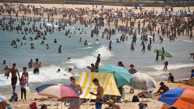 If you’re hoping to get to the beach after work, best be leaving early to avoid transport delays. Picture: AFP/Peter Parks