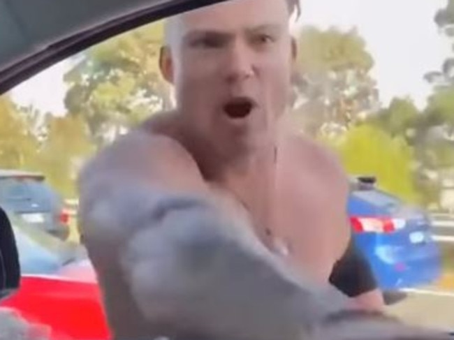 The man seizing the driver by the scruff of the neck. Picture: 9NEWS