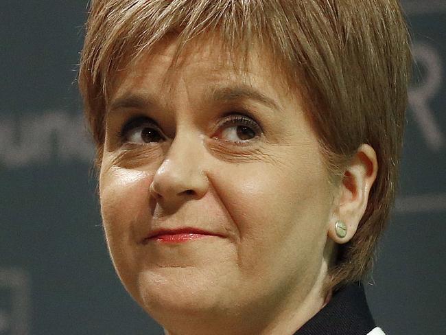 FILE - In this Monday, Feb. 29, 2016 file photo, Nicola Sturgeon, First Minister of Scotland and leader of the Scottish National Party, delivers a keynote address on the benefits of EU membership for work and living standards at an event hosted by the Resolution Foundation at St John's in London. The Scottish government says it will ask Britain's Supreme Court to block Prime Minister Theresa May from triggering European Union exit talks without consulting the Scottish Parliament first., it was reported on Tuesday, Nov. 8, 2016. (AP Photo/Frank Augstein, File)