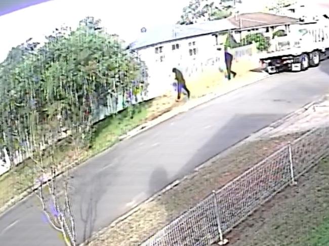 Two masked people get into car and drive away. Photo: NSW Police