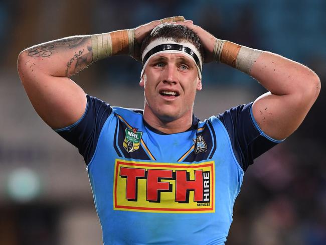 Jarrod Wallace of the Titans reacts during the Round 18 NRL match between the Gold Coast Titans and the Sydney Roosters at Cbus Super Stadium on the Gold Coast, Sunday, July 15, 2018. (AAP Image/Dave Hunt) NO ARCHIVING, EDITORIAL USE ONLY