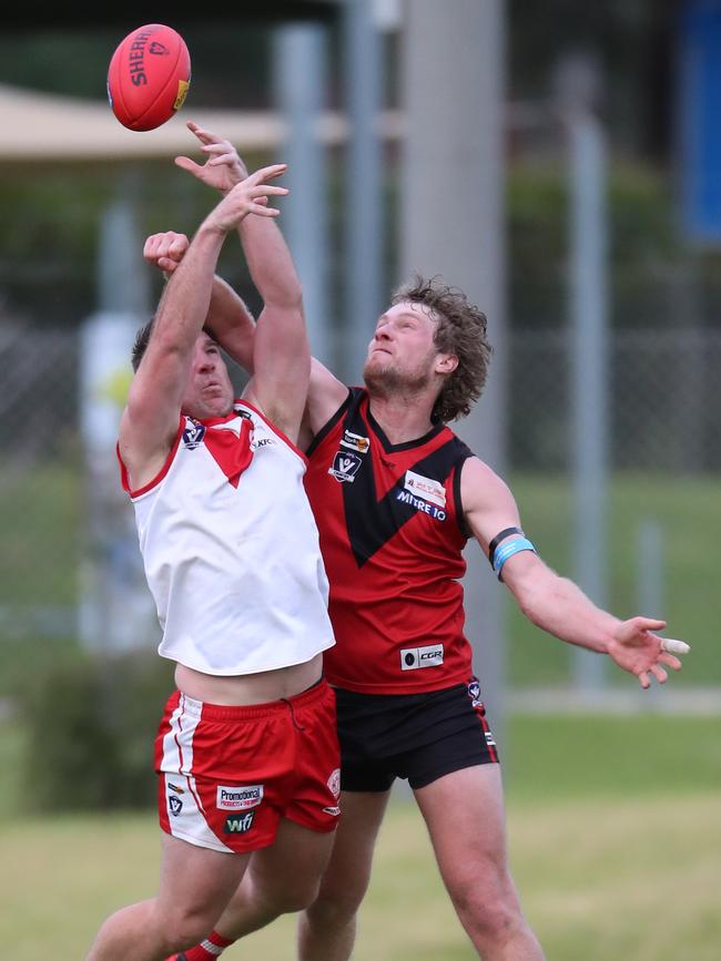 Stawell’s Jackson Dark and Ararat’s Daniel Mendes compete for the ball.