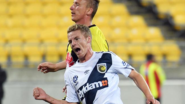 Trent Buhagiar of the Central Coast Mariners slots home the final goal against Wellington Phoenix.
