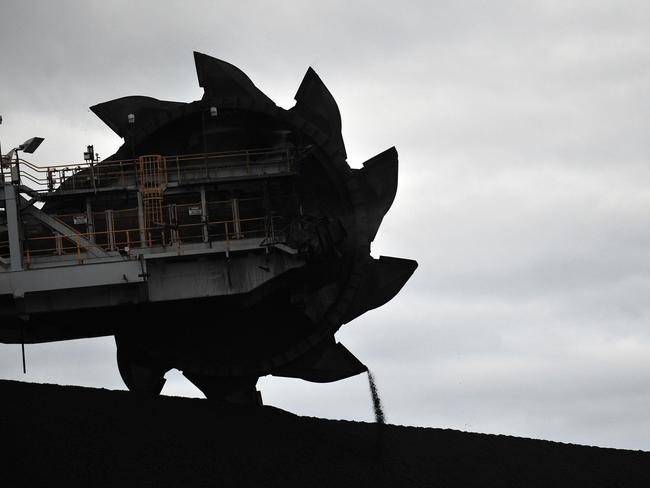 A loader shifts coal in Newcastle on Tuesday, June 5, 2012.  (AAP Image/Paul Miller) NO ARCHIVING