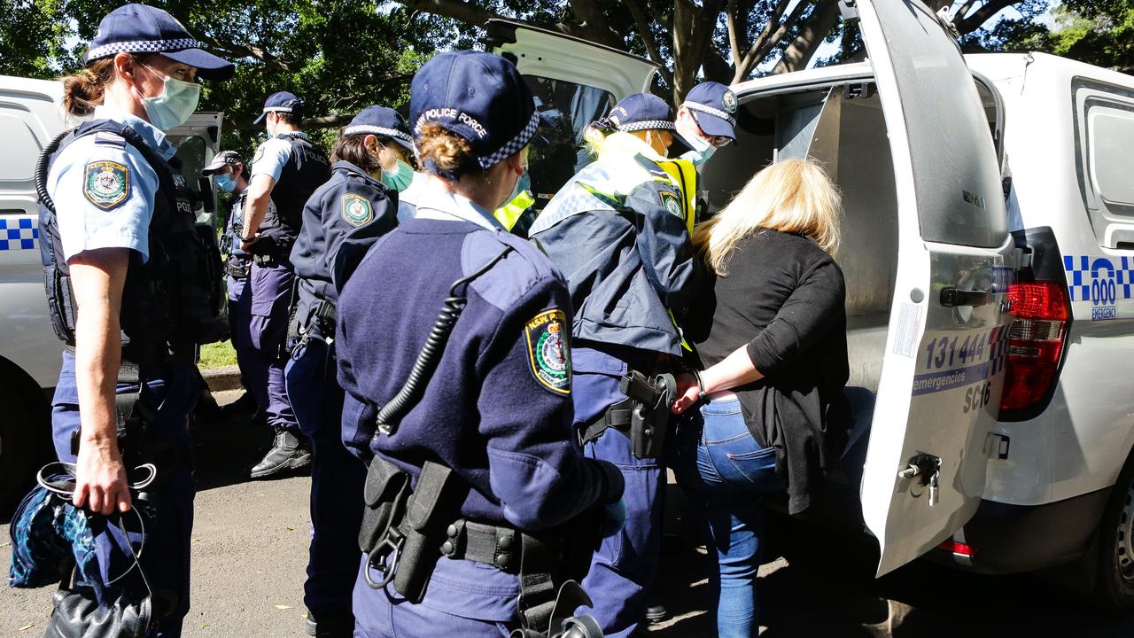 Police arrest members of the public during a protest at Government House in Sydney. Picture: NCA NewsWire/ Gaye Gerard