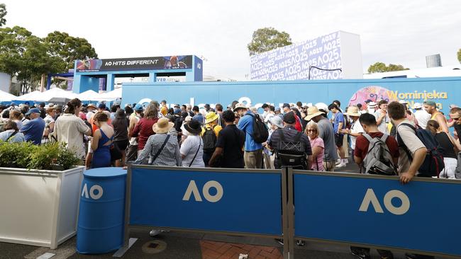 MELBOURNE, AUSTRALIA - JANUARY 12: Fans queue at the gate prior to day one of the 2025 Australian Open at Melbourne Park on January 12, 2025 in Melbourne, Australia. (Photo by Darrian Traynor/Getty Images)