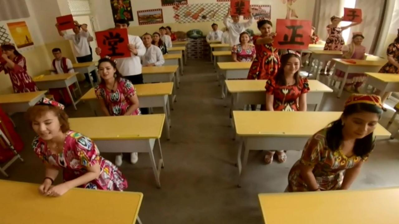 Foreigners in the camps are treated to elaborate dance routines put on by those living there. Source: BBC