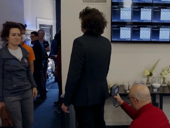 Niemann is given an extra thorough scan. Picture: STL Chess Club