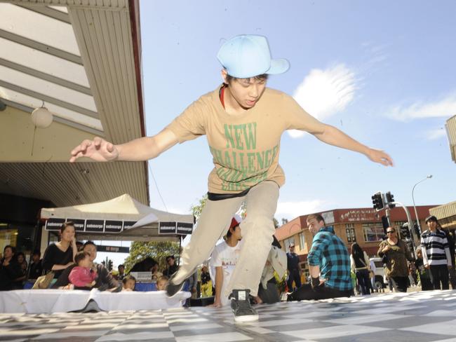 Steven Nguyen breakdances at the Cabramatta Moon festival.