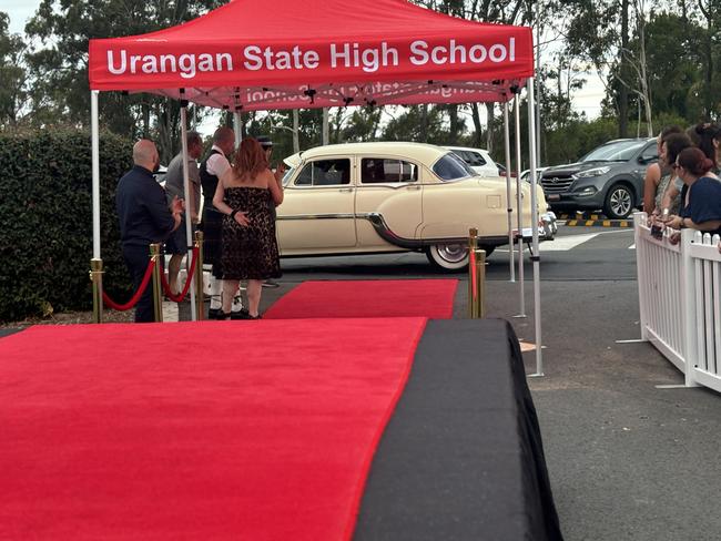 The students of Urangan State High School arriving at their formal.