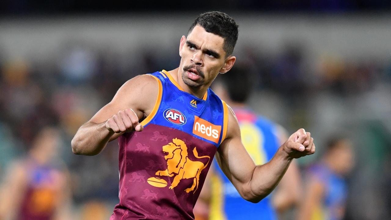 Charlie Cameron celebrates a goal at the Gabba.