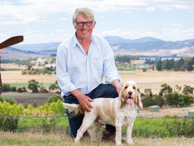 Retired forensic pathologist Dr Chris Lawrence at home, in Richmond, with his dog Honey. Picture: Linda Higginson