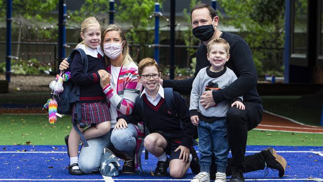 Happy days ahead: Kat and Paul Cheshire with their children Scarlett, 6, Harry, 8, and Tom, 3; the elder two will return to school on Monday. Picture: Aaron Francis