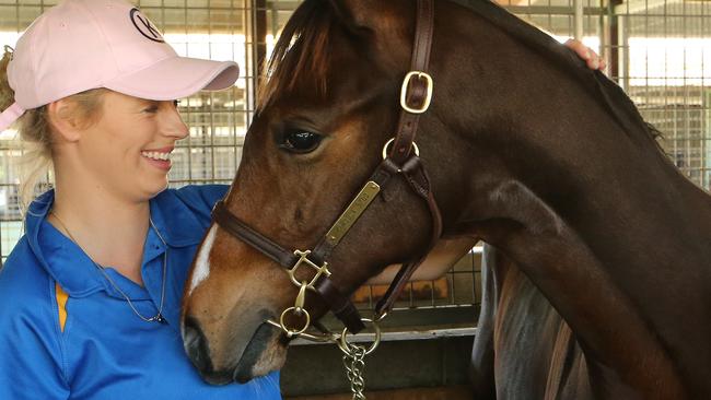 Lot 117, a colt by Not a Single Doubt/ Umaquest from Kambula Stud in South Australia, and handler Amelia Caulton. Picture: Glenn Hampson