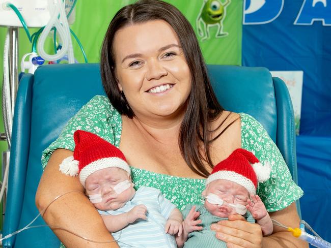 WEEKEND TELEGRAPHS SPECIAL. , PLEASE CONTACT WEEKEND PIC EDITOR JEFF DARMANIN BEFORE PUBLISHING. , UNDER EMBARGO - 24 DECEMBER *** MEDIA RELEASE - Bittersweet Christmas reunion for miracle twins Kai and Maverick, Mater Hospital. Laura Cryer with her babies Kai and Maverick Durham  Mater Hospital. Laura Cryer with her babies Kai and Maverick Durham.  15122023 Picture: Renae Droop/RDW Photography