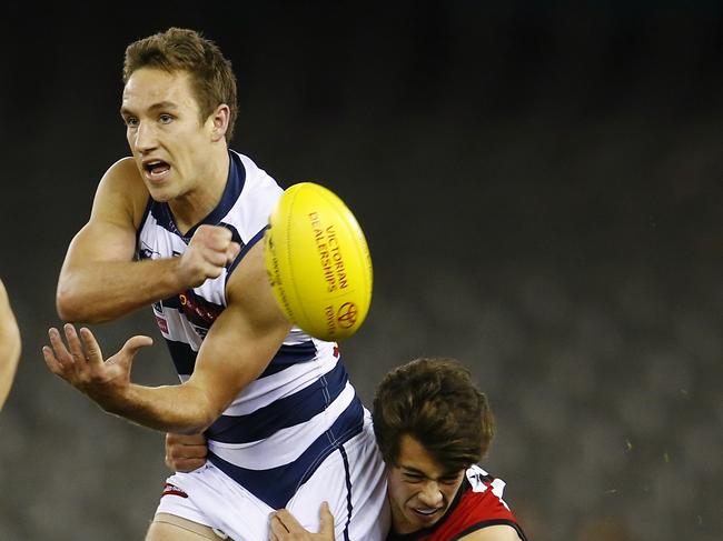 Tom Maas gets a handball away under pressure for Geelong’s VFL side. Picture: Michael Klein