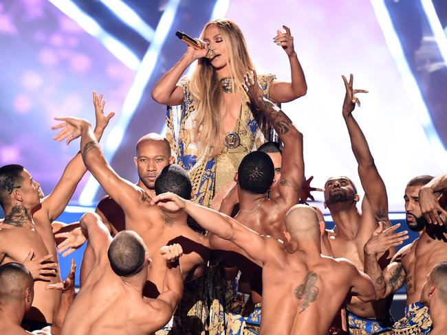 She sang on a pile of near-naked men! Picture: Getty