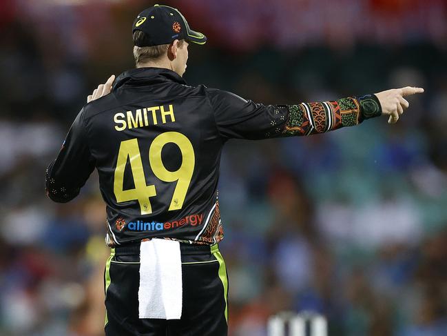 Steve Smith directing field during the T20 International between Australia and India at the SCG. Picture. Phil Hillyard