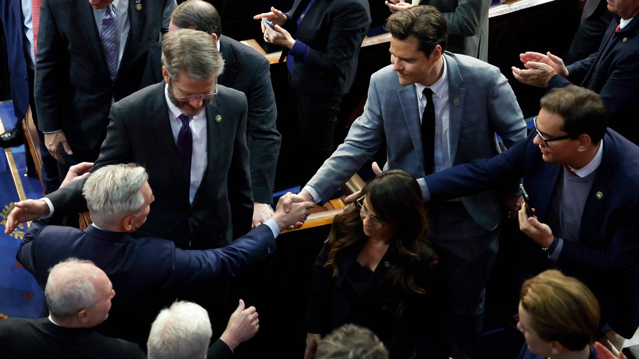 Congratulations after: Matt Gaetz, Tim Burchett and George Santon congratulate McCarthy. Picture: AFP