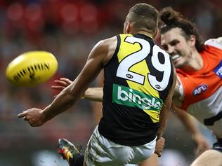 SYDNEY, AUSTRALIA - MAY 20:  Shai Bolton of the Tigers has his shot on goal touched during the round nine AFL match between the Greater Western Sydney Giants and the Richmond Tigers at Spotless Stadium on May 20, 2017 in Sydney, Australia.  (Photo by Ryan Pierse/Getty Images)