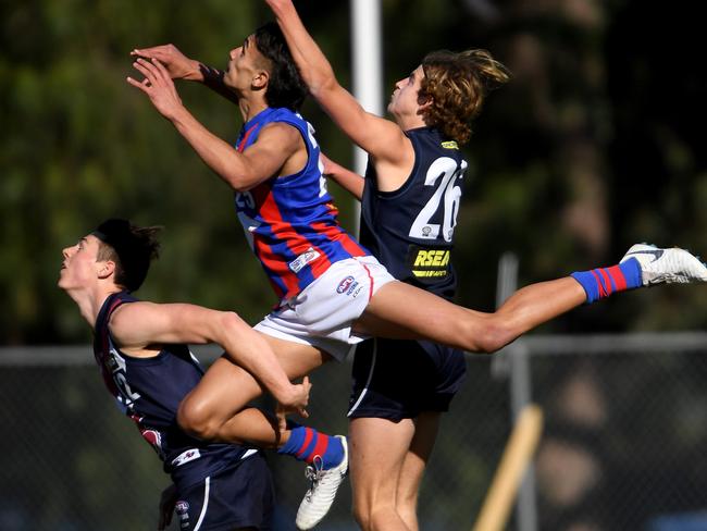 Jamarra Ugle-Hagan and Jesse Castan in action during the NAB League football match between Oakleigh Chargers and Sandringham Dragons in Werribee, Saturday, Aug. 17, 2019. Picture: Andy Brownbill