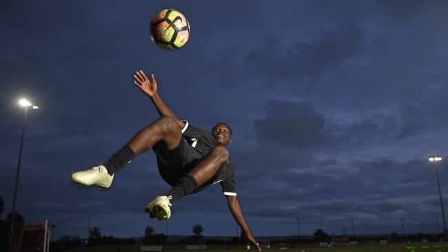 Soccer has helped ex-Burundian refugee Vianne Kurikwimana overcome grief for two cousins who drowned at Glenelg before his father died in a car accident. Picture: Tom Huntley