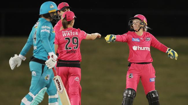 Sixers wicketkeeper Alyssa Healy celebrates with teammates after stumping Nadine de Klerk. Picture: Matt King/Getty Images