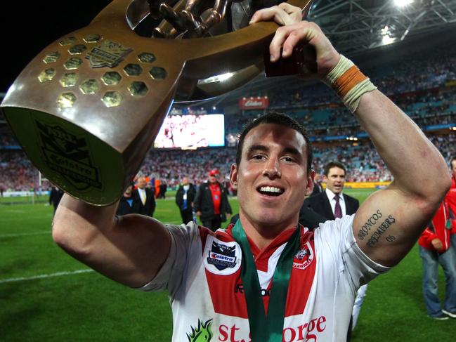 Darius Boyd with the NRL trophy and the Clive Churchill medal after St George-Illawarra Dragons defeated Sydney Roosters in 2010 NRL Grand Final at ANZ Stadium, Olympic Park, Homebush in Sydney.