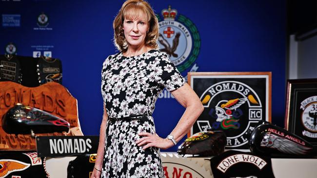 Gang Squad commander Detective Superintendent Deborah Wallace with just some of the recently seized bikie colours. Picture: Sam Ruttyn