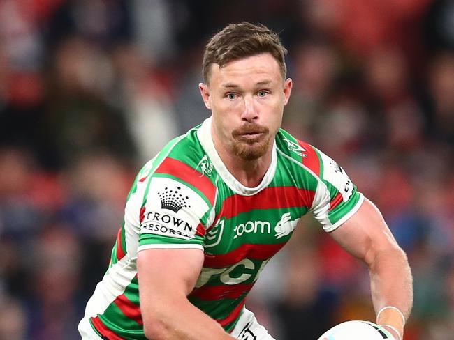 BRISBANE, AUSTRALIA - AUGUST 27:  Damien Cook of the Rabbitohs runs the ball during the round 24 NRL match between the Sydney Roosters and the South Sydney Rabbitohs at Suncorp Stadium on August 27, 2021, in Brisbane, Australia. (Photo by Chris Hyde/Getty Images)