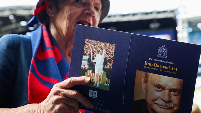 A patron holding the memorial booklet during the service. Picture: Getty Images