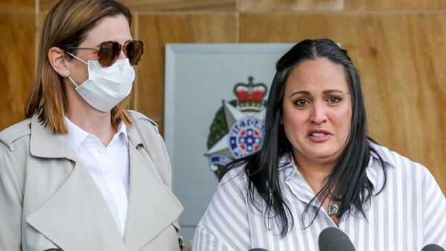 Victim Jacquelyn and her friend speak to police about a brutal assault outside Box Hill police station. Picture: Tim Carrafa