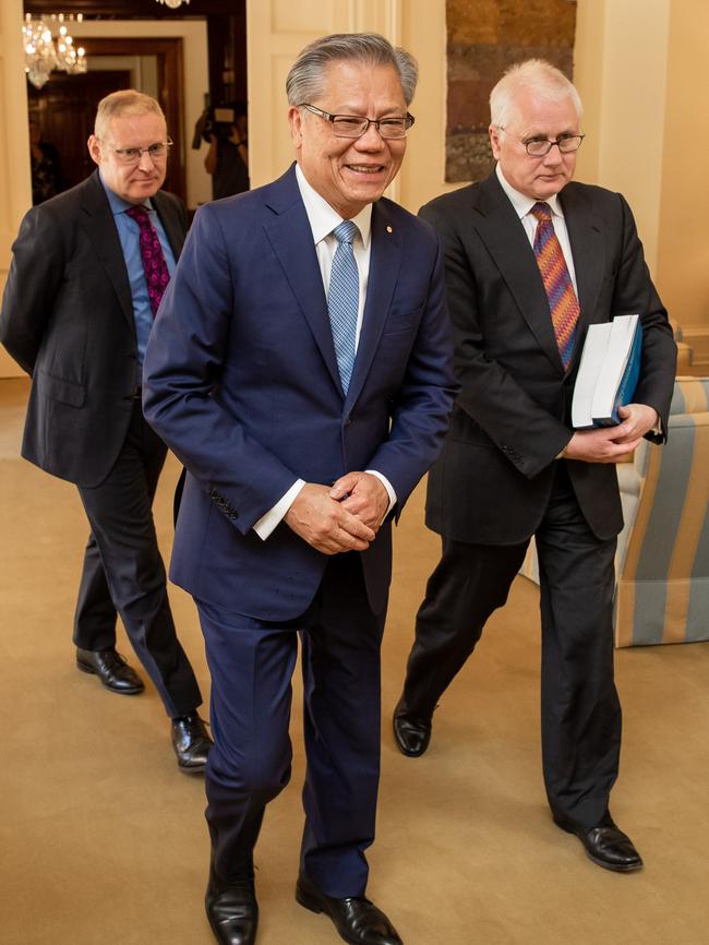 Commissioner Bret Walker delivers the Murray-Darling Basin Royal Commission report to SA Governor Hieu Van Le. Picture: AAP / James Elsby