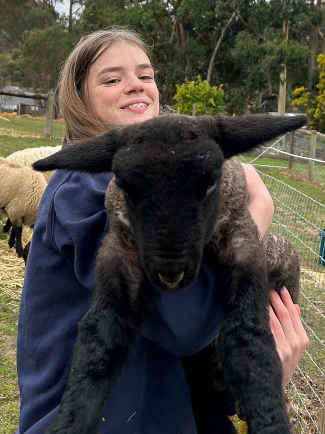 Lyla Neck and her pet lamb Rocco. Picture: Supplied