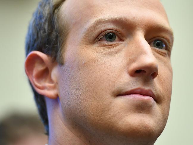 (FILES) In this file photo Facebook Chairman and CEO Mark Zuckerberg arrives to testify before the House Financial Services Committee on "An Examination of Facebook and Its Impact on the Financial Services and Housing Sectors" in the Rayburn House Office Building in Washington, DC on October 23, 2019. - Facebook says it will block ads from foreign state media during the US election, as well as allowing users to hide all paid-for political messages.  The move comes with the social media giant under growing pressure over its hands-off approach to misinformation and inflammatory posts -- including from Donald Trump -- and following criticism it turned a blind eye to foreign interference in the 2016 presidential poll. Nick Clegg, writing in the UK's Daily Telegraph newspaper on June 17, 2020, said the company would be "blocking all ads in the US during the election period from state-controlled media organisations from other countries." (Photo by MANDEL NGAN / AFP)