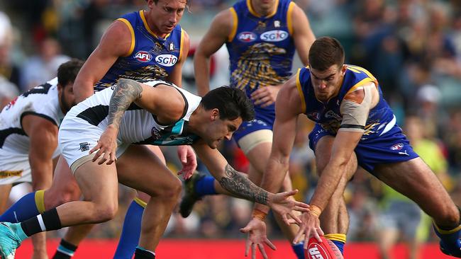 Chad Wingard battles the Eagles’ Scott Lycett for the ball during their clash in Perth. Picture: Paul Kane (Getty Images)