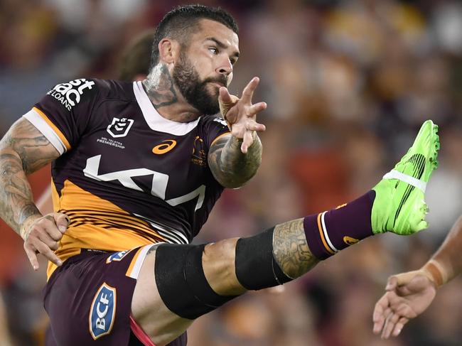 Brisbane Broncos halfback Adam Reynolds kicks the ball against teh SOuth SYdney Rabbitohs. Pictures: NRL Images