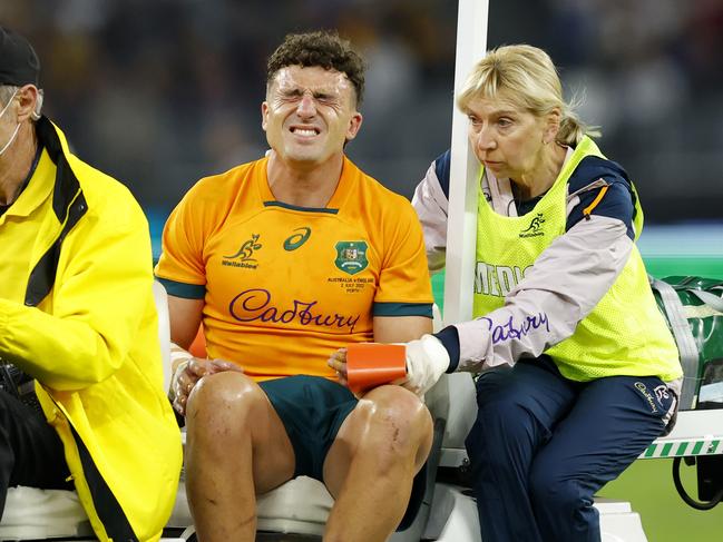 Tom Banks gets carted off after badly breaking his arm. Picture: James Worsfold/Getty Images