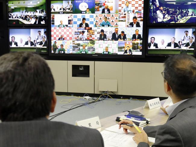 A teleconference is held at Hokkaido Government in Sapporo, northern Japan after North Korea fired a missile over the country. Picture: Masanori Takei/Kyodo News/AP