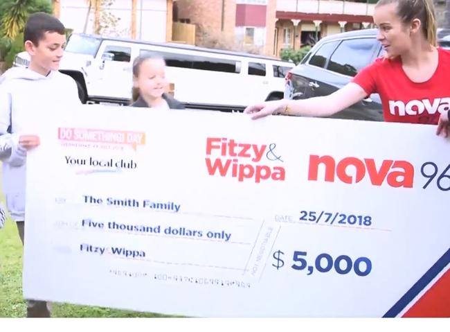 Fitzy &amp; Wippa surprised Glen Smith with a $5000 cheque from Campbelltown Golf Club.