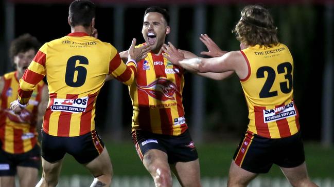 Morphettville Park’s Edward Doak celebrates one of his two first quarter goals with teammates Jack Sutto and Kye Dean in their preliminary final win over Walkerville at Glenelg Oval on Friday night. Picture: Dean Martin